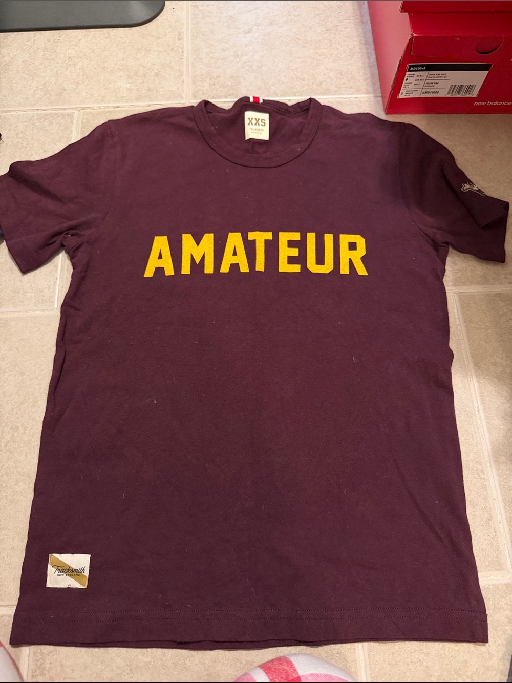 Tracksmith Men's Short Sleeve Tee in Dark Burgundy with Yellow Logo